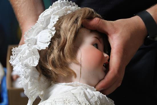 An AM 1894 doll, 18in. and a Heubach doll, bent limb, lower detached, 22in. (a.f.) (2)